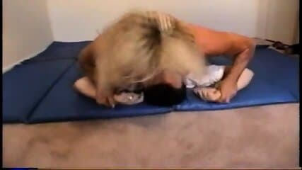 | Nude female bodybuilder dominates male with scissors, facesits, ass smothers and breast smothers, muscle worship