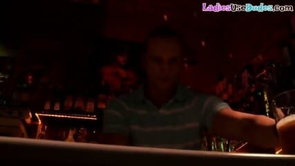 Strapon dommes fuck sissy subject in the bar